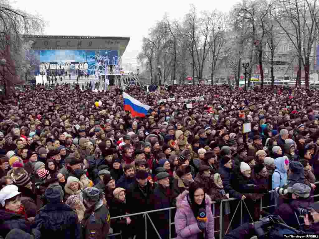 The rally in downtown Moscow on December 26 was organized by civil groups in reaction to rioting on December 11 when thousands of nationalists and football fans poured into the streets chanting, "Russia for Russians."