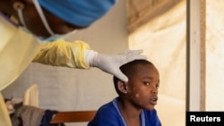 FILE PHOTO: A child suffering from mpox in Democratic Republic of Congo