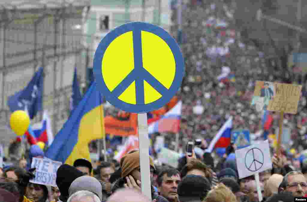 Russia - People take part in an anti-war procession and a rally in Moscow March 15, 2014.